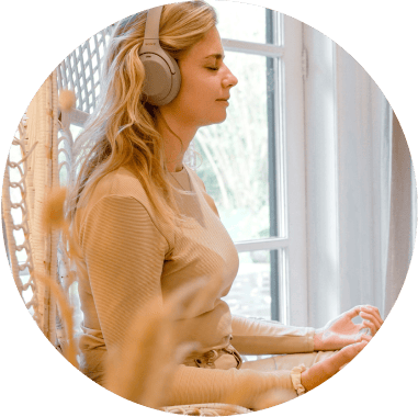 Woman listening to the Meditation Moments app